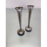 A pair of Birmingham silver tapered flower tubes with beaded borders and circular beaded bases, (h
