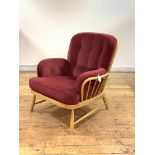 Ercol, a light beech and elm lounge easy chair, with hoop and spindle back and arms, fitted