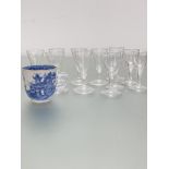 A set of seven Edwardian spiral lobbed cordial glasses with domed folded feet, (h 10cm x d 5cm), and