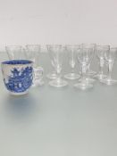 A set of seven Edwardian spiral lobbed cordial glasses with domed folded feet, (h 10cm x d 5cm), and