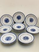 A set of fourteen continental Chinese style dessert plates, decorated with handpainted floral blue