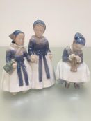 A Royal Copenhagen Danish porcelain figure of two girls in traditional Danish costume, (h 20cm x