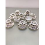A Royal Worcester Bermina floral decorated 18-piece coffee set