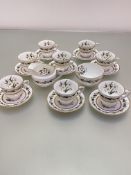 A Royal Worcester Bermina floral decorated 18-piece coffee set