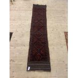 A Meshwani runner rug, with pole medallion and bordered, 260cm x 56cm