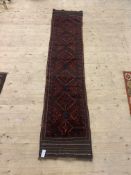 A Meshwani runner rug, with pole medallion and bordered, 260cm x 56cm