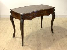 A kingwood bureau plat in the Louis XV taste, 20th century, of serpentine outline, the marquetry top