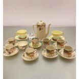 A Grindley fifteen piece coffee set decorated with transfer printed crocus design, Grays Pottery