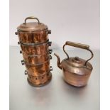 An Edwardian copper brass handled five section steamer cooking pot with pierced base section and