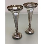 A pair of Birmingham silver panelled flower tubes on circular weighted bases, Birmingham 1912, (h