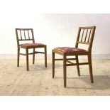 G-Plan, A pair of light oak chairs, model number B629, circa 1950's, each with spar back, drop in