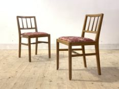 G-Plan, A pair of light oak chairs, model number B629, circa 1950's, each with spar back, drop in