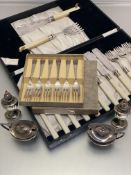 An Epns four-piece condiment set, pastry forks, faux ivory knives and forks etc, faux handled