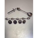 An Edinburgh silver Viking long boat panel bracelet, (approximate w 7 cm L 17cm), a Claymore,