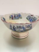 A Scottish pottery fruit bowl decorated with Chinese transfer printed panels with inscription The