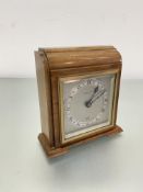 A 1930's mahogany cased Eliot clock, retailed by Wilson & Sharp Ltd Edinburgh, with silver dial