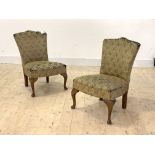 A pair of 1930s upholstered bedroom chairs, raised on stained beech cabriole supports, H73cm, W50cm,