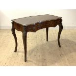 A kingwood bureau plat in the Louis XV taste, first half of the 20th century, of serpentine outline,