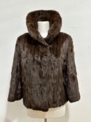 A lady's dyed brown squirrel jacket with cowl style collar and neck and satinised lining (L from