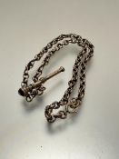 A 19thc fancy link and belch link mounted guard style chain with small propelling pencil, a/f, (