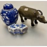A Chinese shaped box with stylised vase and flower design, top a/f, and a blue and white hawthorn