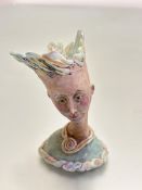 Sarah Honeyman Swedish, a handmade porcelain bust of a woman decorated with polychrome enamels
