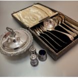 A set of six soup spoons and serving spoon, complete with fitted case, an Epns circular muffin
