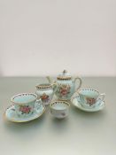 A Adams Calyx Ware part tea service with a green glaze decorated with floral posy, one tea pot,