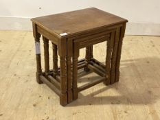 A 1940's oak nest of three tables, H46cm, W50cm. D35cm