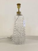 A moulded glass table light, of crushed bottle form, H46cm