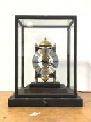 A late 20th century night time lantern style brass skeleton clock, the silvered dial with Roman