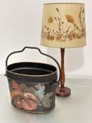 An Edwardian cast iron oval coal pail with loop handle to top with decoupage floral decoration (
