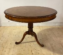 A Quality Georgian style walnut library drum table, the circular top with parquetry inlay and a