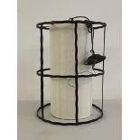 An Arts and Crafts style wrought metal lantern four branch light fitting of cylindrical form, H53cm