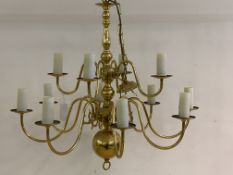 A Dutch style gilt brass twelve branch chandelier, with chain and rose, H68cm (Excluding shade)
