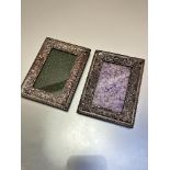 A pair of Sheffield plated figure and c scroll photograph frames, (internal 12cm x 7cm with