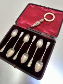 A set of six Birmingham silver Edwardian tea spoons with spiral stems and leaf design with