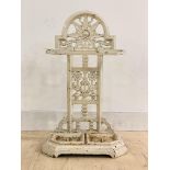 A Victorian white painted cast iron stick stand, the back of floral openwork design, with two drip