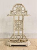 A Victorian white painted cast iron stick stand, the back of floral openwork design, with two drip