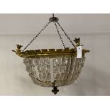 An Edwardian floral cast gilt brass ceiling pendent light fitting, with multiple glass lustre