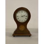 An Edwardian inlaid mahogany balloon time piece clock, with white enamel dial painted with Roman