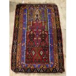 An old flat weave kilim prayer rug, of all over geometric design centred by a mihrab, 111cm x 170cm