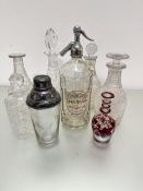 A pair of hobnail cut decanters, a/f, one with odd stopper, a crystal slice cut sherry decanter, a