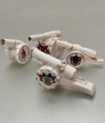 A collection of four crested china gun carriages, including Richmond Surrey by Shelley, Aberystwyth,