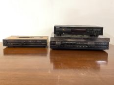 A Bang and Olufsen Beocord 1100, a Bang and Olufsen Beocenter 1800 and a Panasonic CD 720 player
