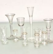 A modern tapered triple opaque spiralled cordial glass with spreading foot, (h 23cm) and 18thc