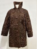 An AE Ball, 111 George Street, Edinburgh, 1920s/30s Astrakan brown curled fur lady's jacket with a
