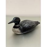 H.Baker carved wood decoy of a Loon painted with polychrome enamels and inset glass eyes, signed