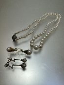 A cultured pearl graduated necklace with silver marquisette fastening, (L 24cm) and a pair of yellow