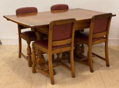 An Art Deco period oak duo drawer leaf extending dining table, on baluster turned and sledge